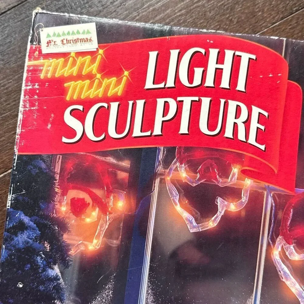 Vintage 1990s Mr Christmas mini mini light up sculpture string lights Santa face